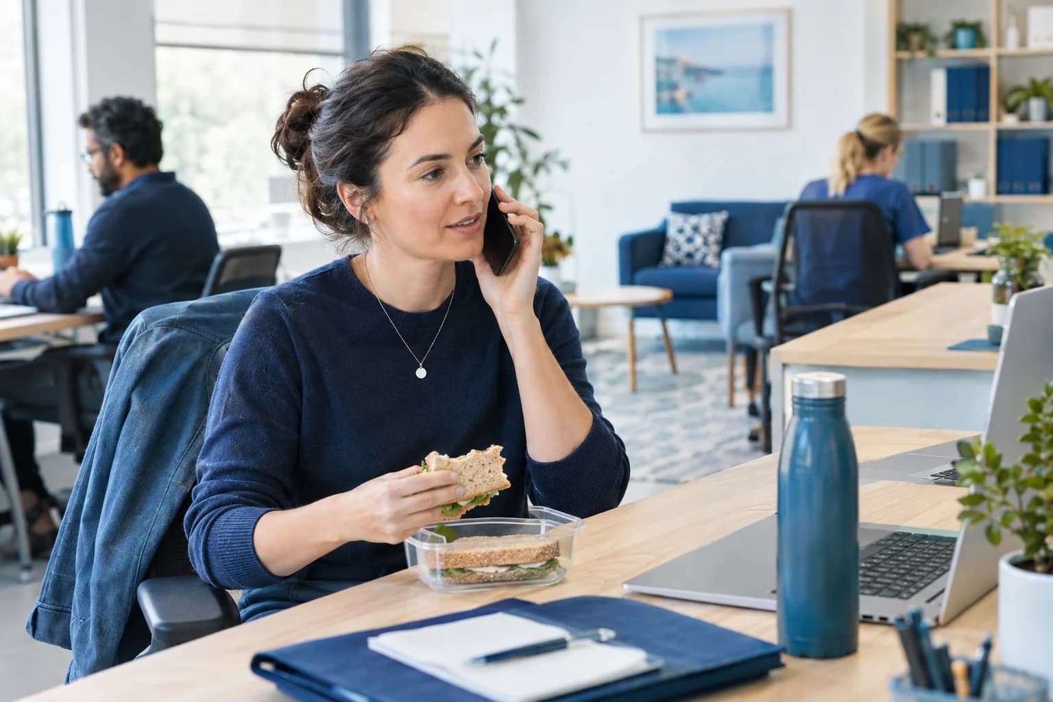 Photo of a person calling from their office desk at lunchtime