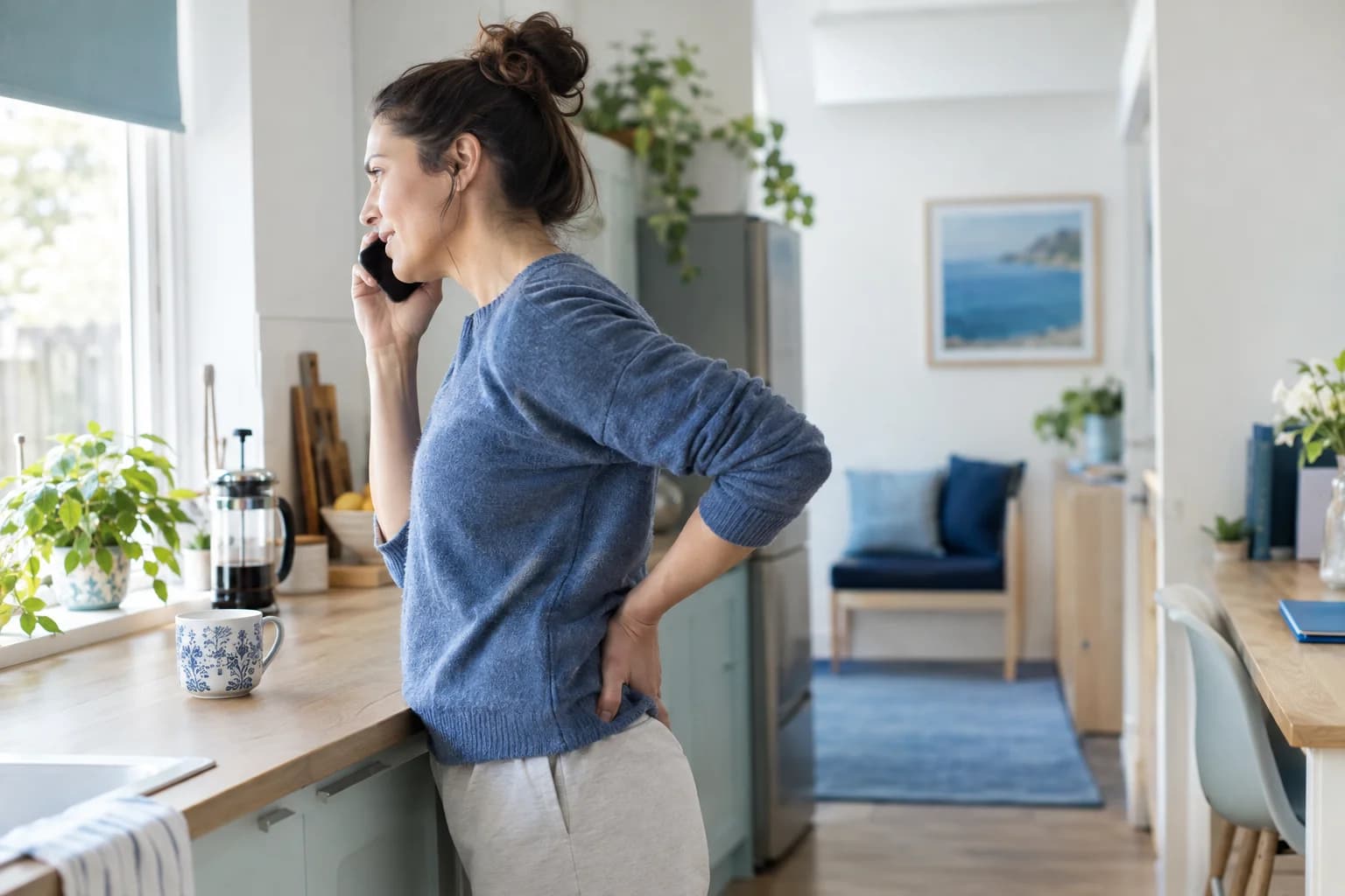 Photo of a person at home on a Sunday calling about their back